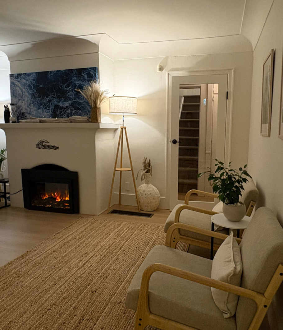 Calming lobby of Ocean Glow Wellness, to check-in for massage therapy and red-light therapy wellness services. 